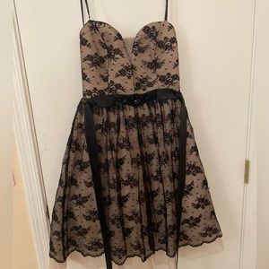 Nude dress with black lace. Size jrs 9/10.